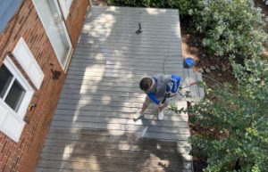 JB Power Clean technician washing patio
