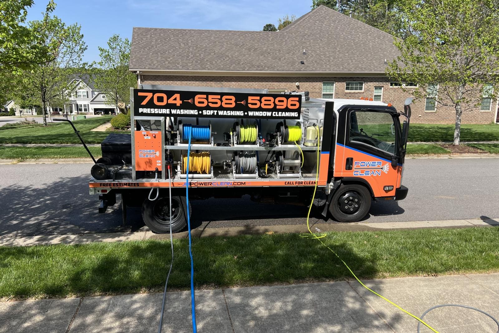 JB Power Clean truck with pressure washing and window cleaning equipment